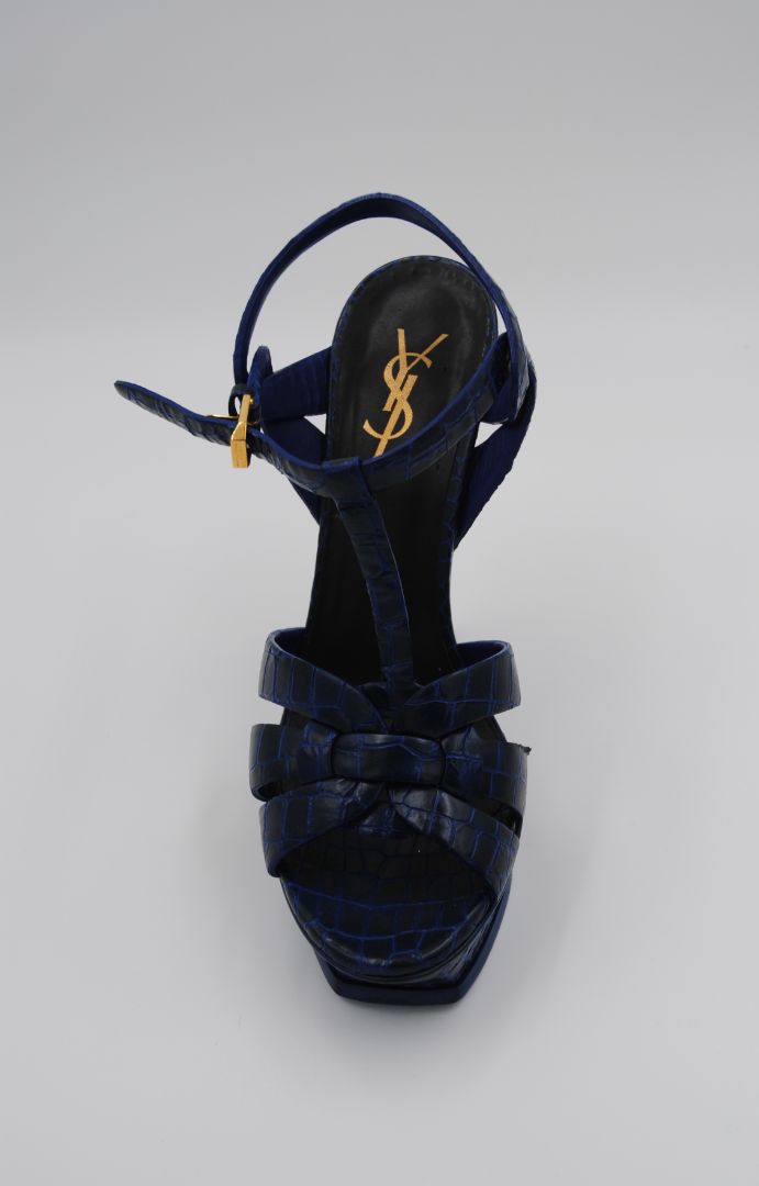 Saint Laurent Calfskin Crocodile Embossed Tribute 105 Platform Sandals in Marinette

Saint Laurent calfskin crocodile embossed Tribute 105 platform sandals, women’s size 38 in Marinette, luxury designer heels with buckle ankle strap and 105mm stiletto heel