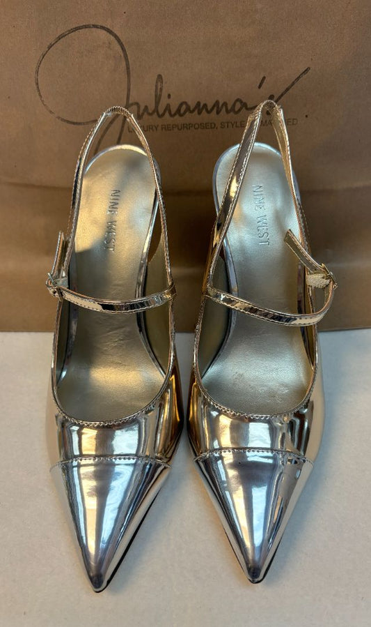 High-shine silver Nine West pumps with stiletto heel