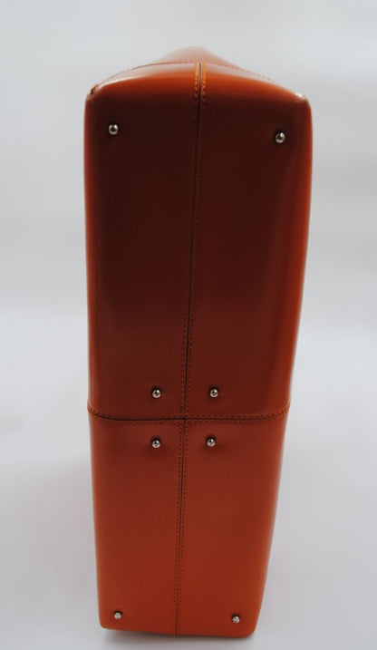 TOD'S D-Bag medium orange leather tote with double handles and fine stitching detail