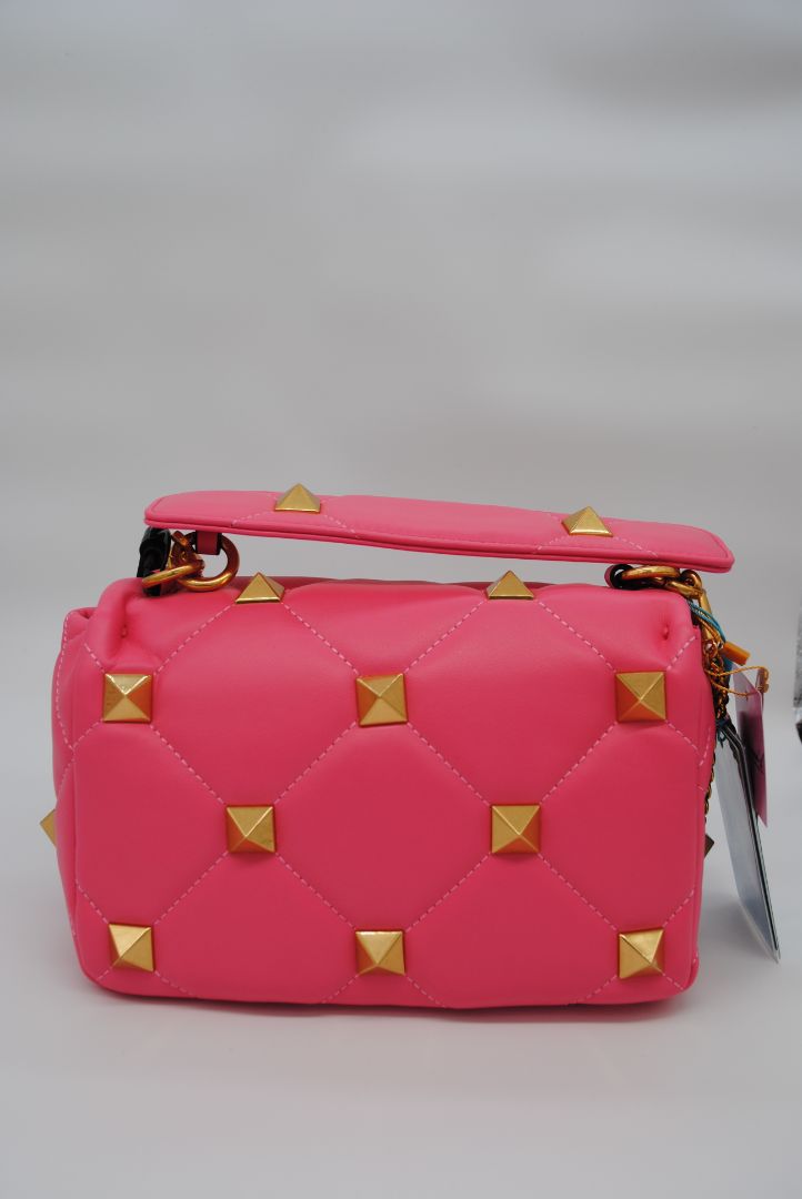 Back of Tiffany and Fred quilted shoulder bag in hot pink leather with subtle stitching details
