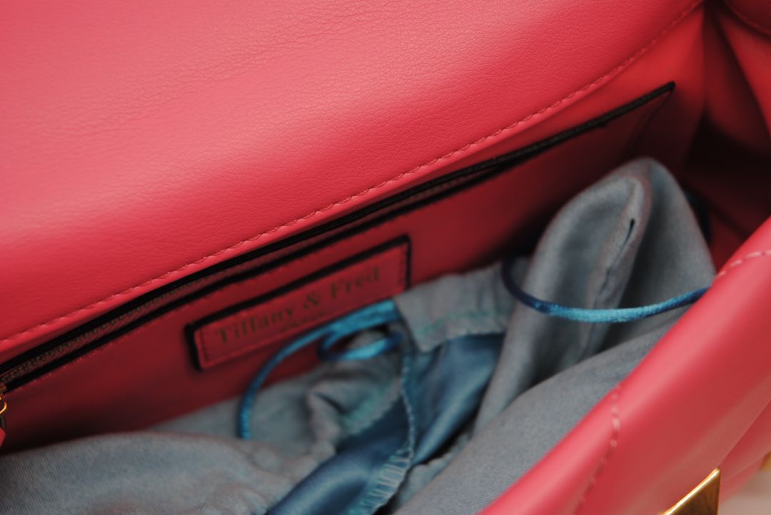 Interior of Tiffany and Fred sheepskin leather bag with fabric lining and zip pocket