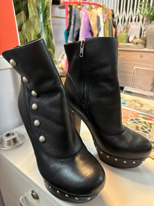 UGG Cosima platform boots showing side zipper and platform heel