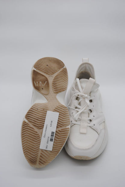 Women's white Zara sneakers with clean design